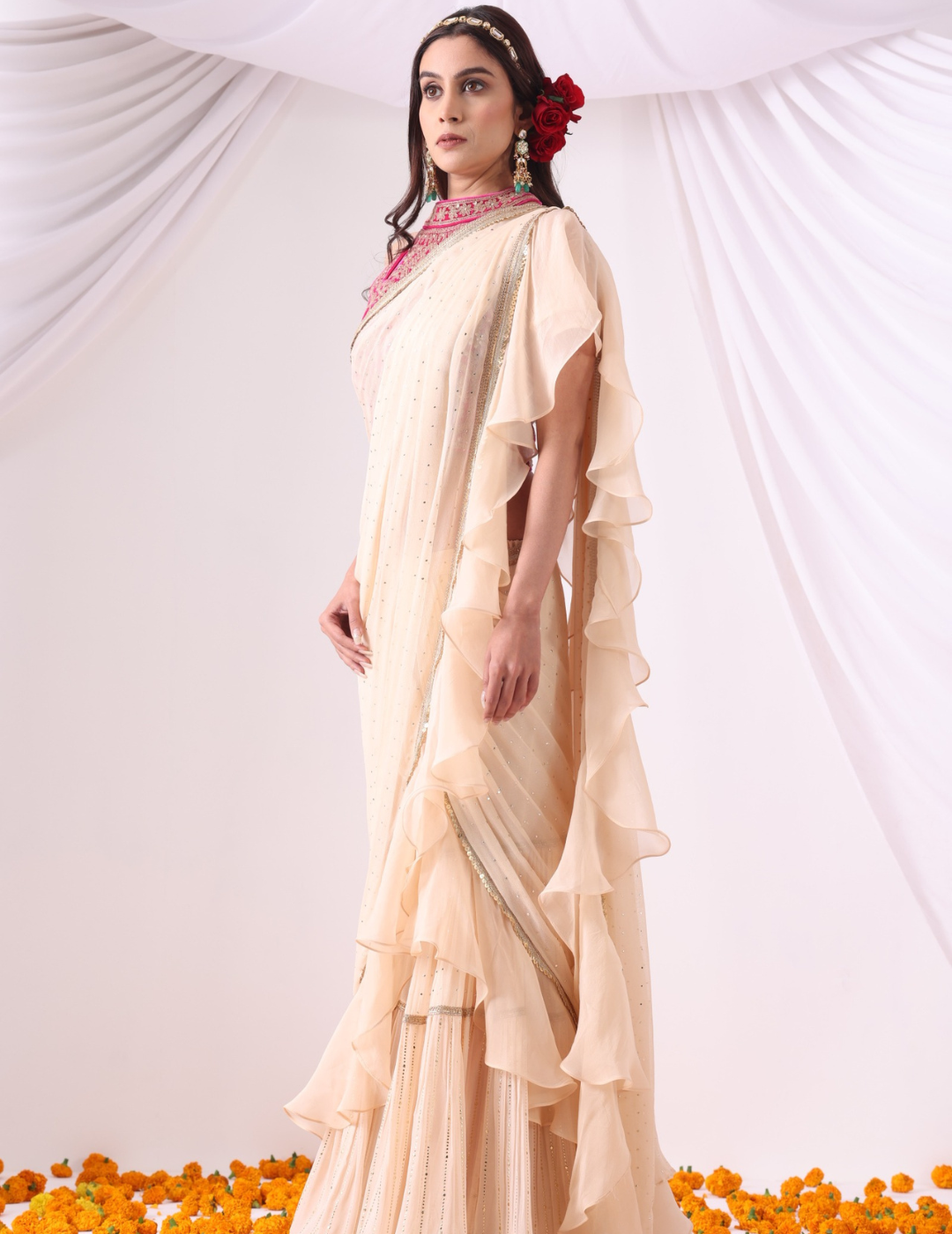 Beige Draped Saree with Magenta Halter Blouse