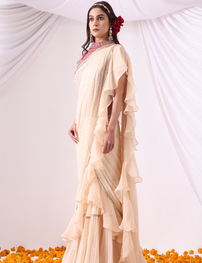 Beige Draped Saree with Magenta Halter Blouse