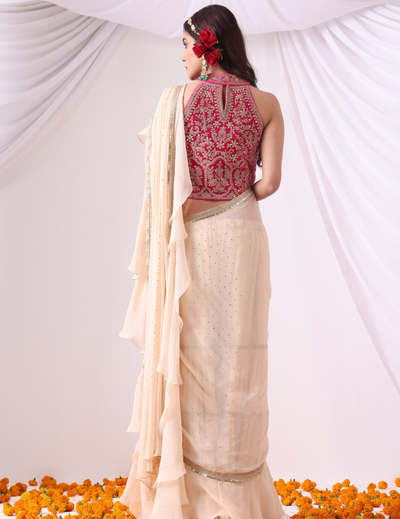 Beige Draped Saree with Magenta Halter Blouse